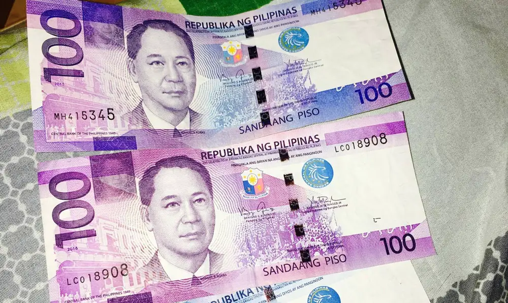 $1 to philippine peso